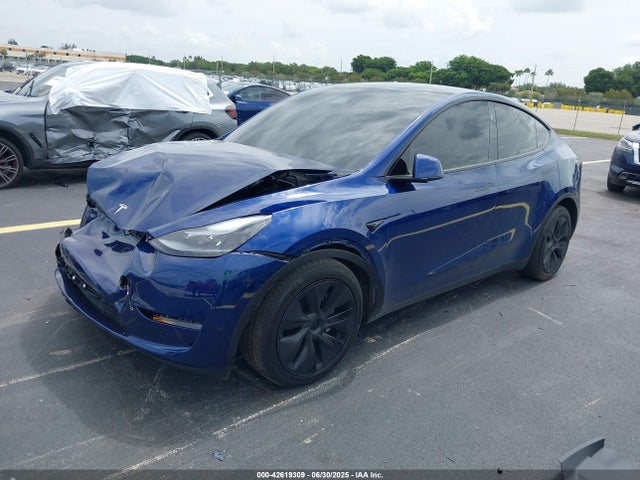 2024 TESLA MODEL Y 7SAYGDEE0RA312716 Photo 1
