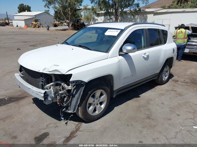 1C4NJCBA1ED696684 Jeep 2014