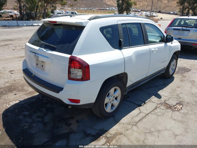 1C4NJCBA1ED696684 Jeep 2014