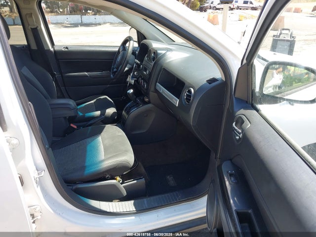 1C4NJCBA1ED696684 Jeep 2014