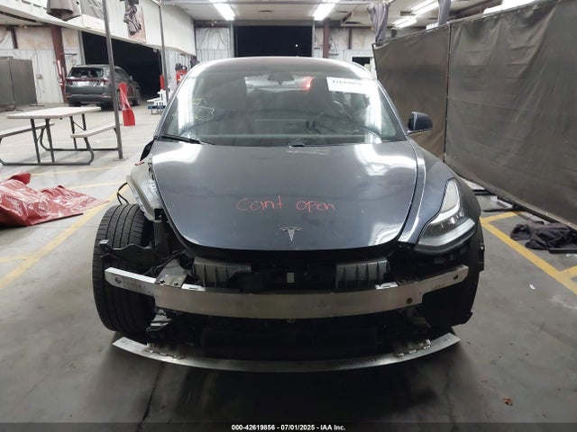 5YJ3E1EA4JF009504 Tesla 2018