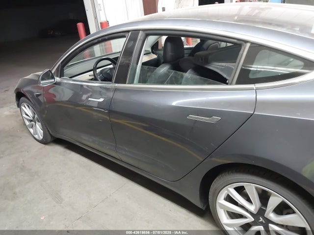 5YJ3E1EA4JF009504 Tesla 2018