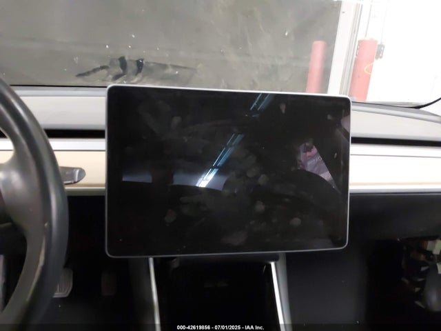 5YJ3E1EA4JF009504 Tesla 2018