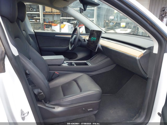 2023 TESLA MODEL Y 7SAYGDEE6PF609232 Photo 4