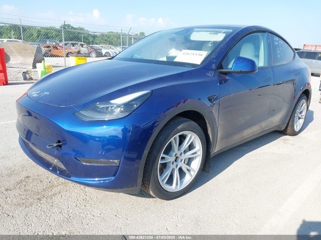 2024 TESLA MODEL Y 7SAYGAEE2RF048271 Photo 1