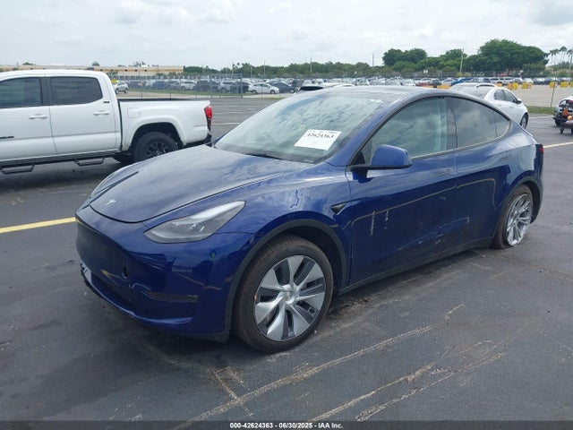 2024 TESLA MODEL Y 7SAYGDEE2RA230938 Photo 1