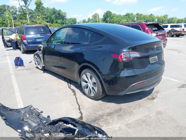 2023 TESLA MODEL Y 7SAYGDEE2PF666379 Photo 2