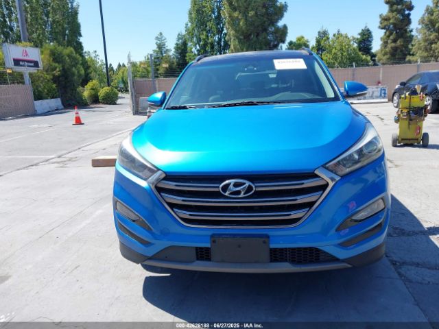 KM8J3CA2XGU222864 Hyundai Tucson