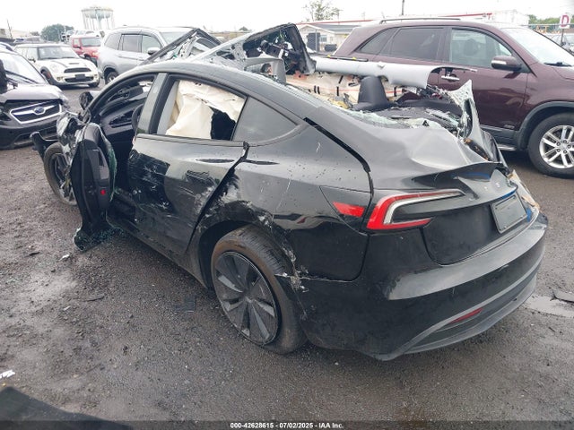 2025 TESLA MODEL 3 5YJ3E1EB4SF941504 Photo 2