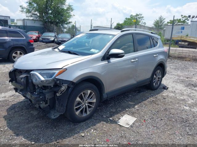2018 TOYOTA RAV4 HYBRID JTMRJREV9JD196138 Photo 1
