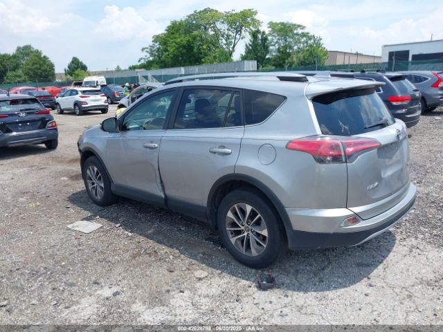 2018 TOYOTA RAV4 HYBRID JTMRJREV9JD196138 Photo 2