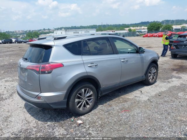2018 TOYOTA RAV4 HYBRID JTMRJREV9JD196138 Photo 3