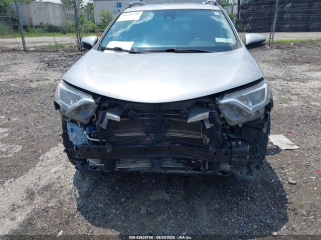 2018 TOYOTA RAV4 HYBRID JTMRJREV9JD196138 Photo 5