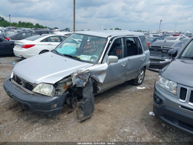 1999 HONDA CR-V JHLRD186XXC082275 Photo 1