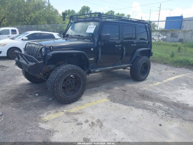 2012 JEEP WRANGLER UNLIMITED 1C4HJWEG5CL161049 Photo 1