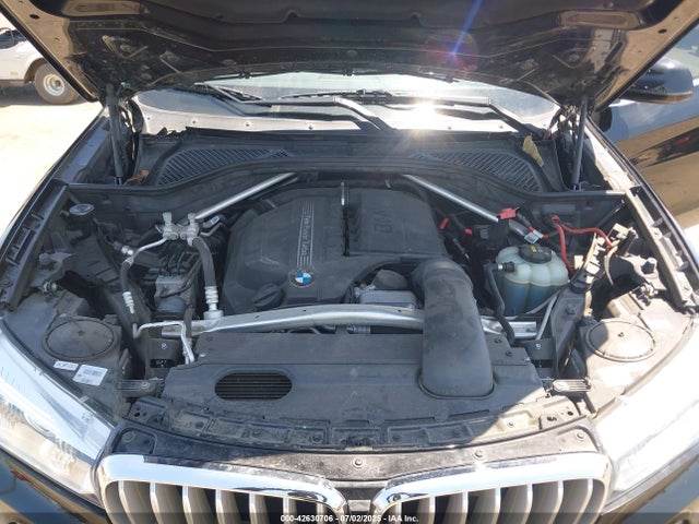 5UXKR2C59H0U19038 BMW 2017
