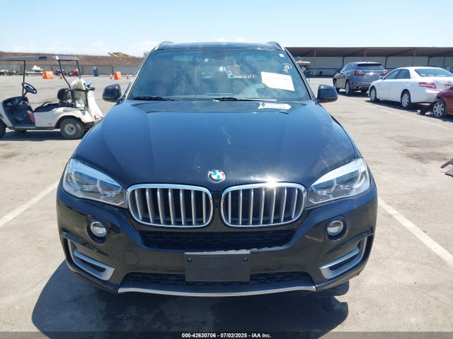 5UXKR2C59H0U19038 BMW 2017