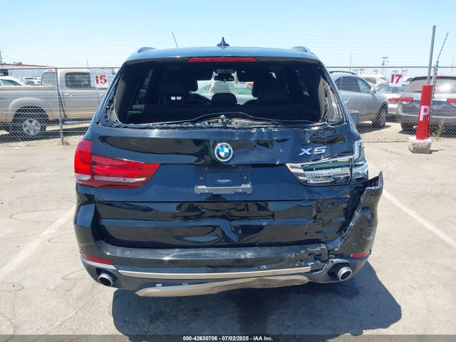 5UXKR2C59H0U19038 BMW 2017
