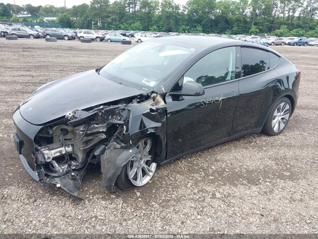 2024 TESLA MODEL Y 7SAYGDEE7RA265748 Photo 1