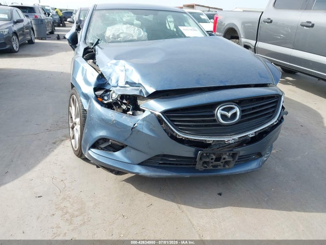JM1GJ1V56G1452948 Mazda py