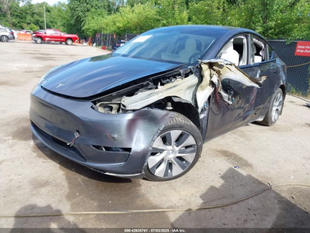 2023 TESLA MODEL Y 7SAYGAEE8PF880355 Photo 1