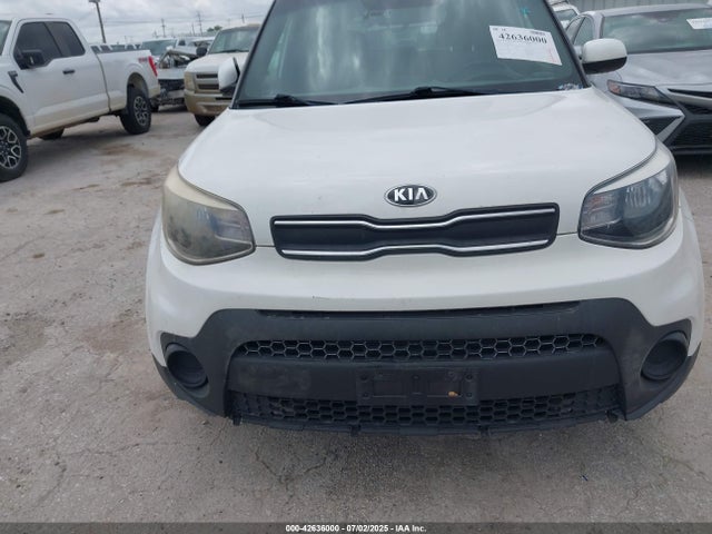 KNDJN2A27J7610570 KIA g