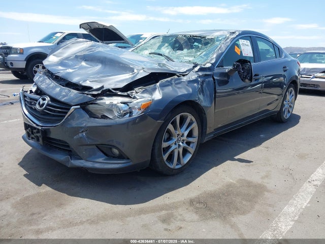JM1GJ1W61E1157650 Mazda py