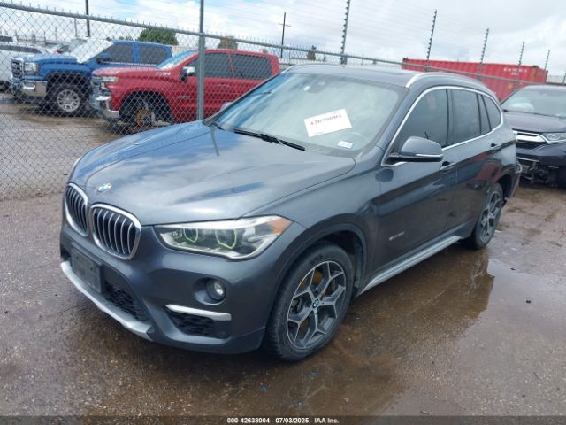 2017 BMW X1 WBXHU7C38H5H34458 Photo 1