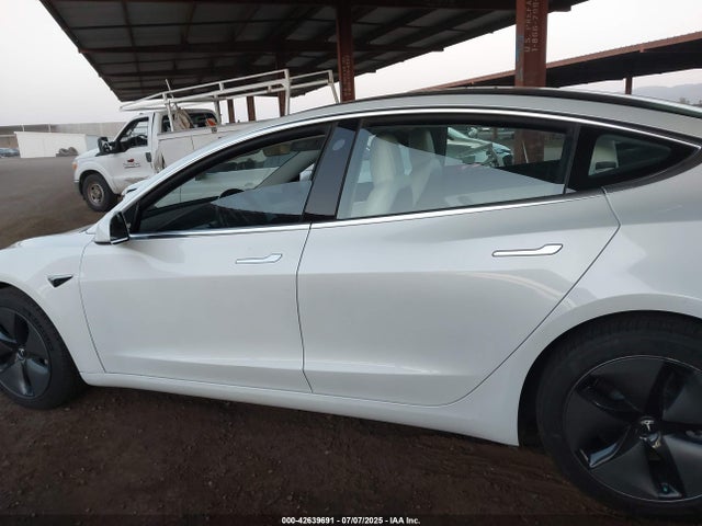 5YJ3E1EA3JF155523 Tesla 2018