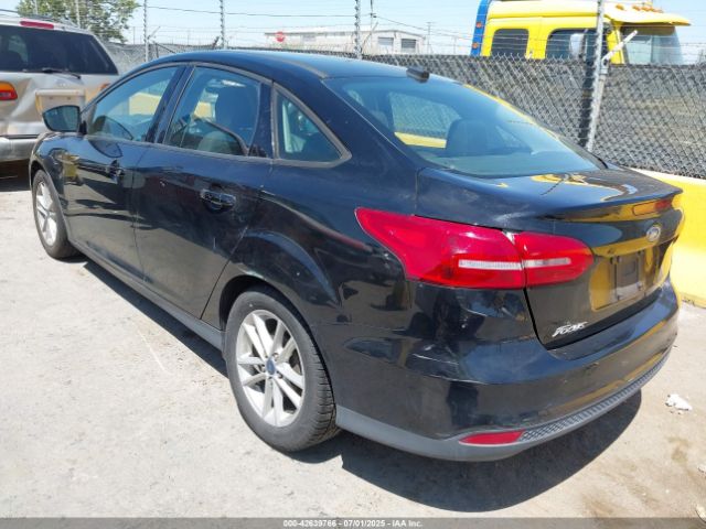 2017 FORD FOCUS 1FADP3F23HL223401 Photo 2