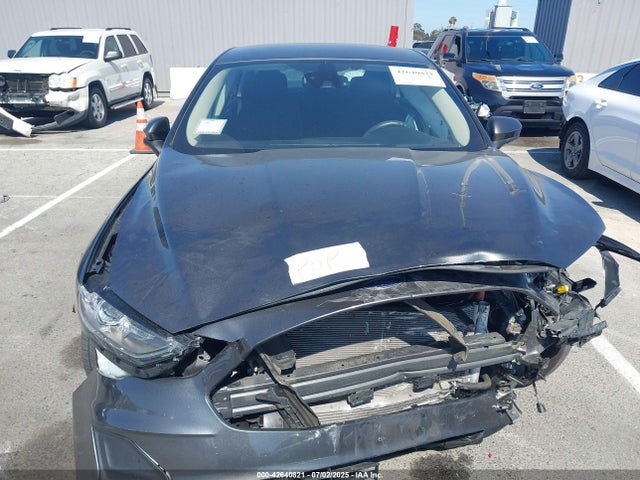 3FA6P0LUXKR174106 Ford 2019