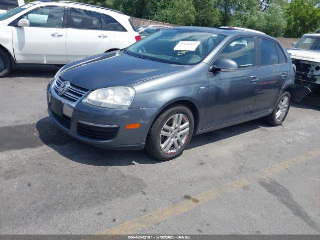2009 VOLKSWAGEN JETTA 3VWRJ71K09M019507 Photo 1