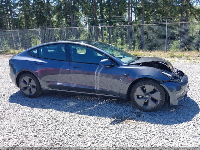 5YJ3E1EB1NF237216 Tesla 2022
