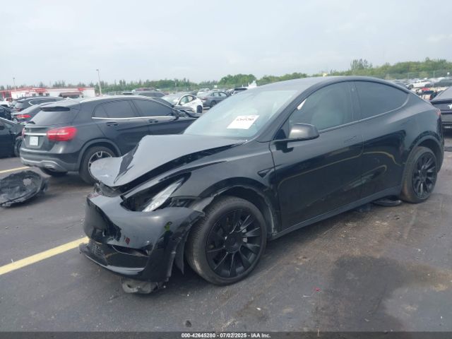2022 TESLA MODEL Y 7SAYGDEE4NF318774 Photo 1