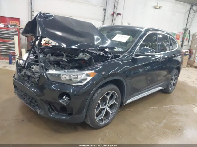 2018 BMW X1 WBXHT3C38J5L33068 Photo 1
