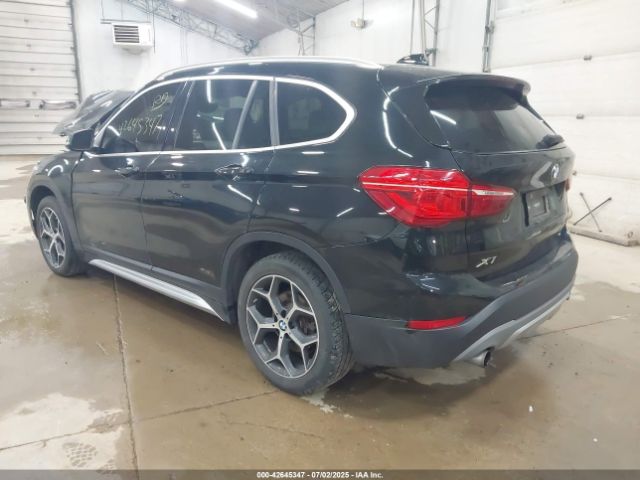 2018 BMW X1 WBXHT3C38J5L33068 Photo 2