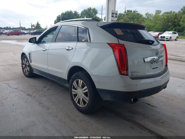 2015 CADILLAC SRX 3GYFNEE31FS583704 Photo 2