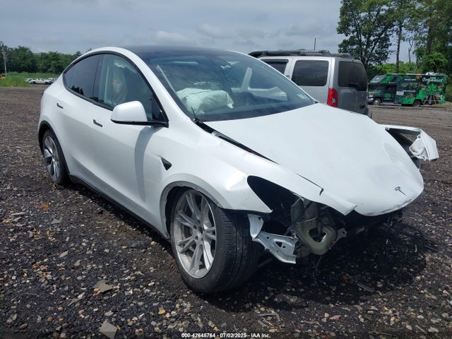 2023 TESLA MODEL Y 7SAYGDEE2PA130075 Photo 0