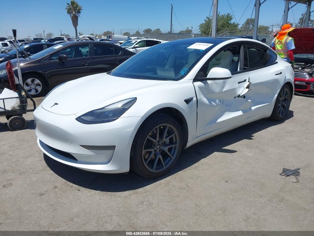 2023 TESLA MODEL 3 5YJ3E1EA4PF512121 Photo 1