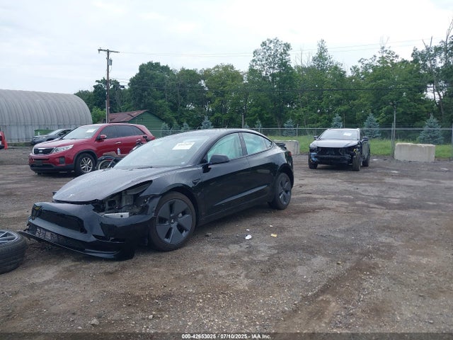 2023 TESLA MODEL 3 5YJ3E1EA2PF495707 Photo 1
