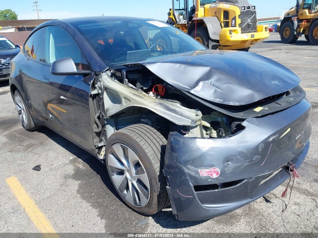 2023 TESLA MODEL Y 7SAYGDED4PF934050 Photo 0