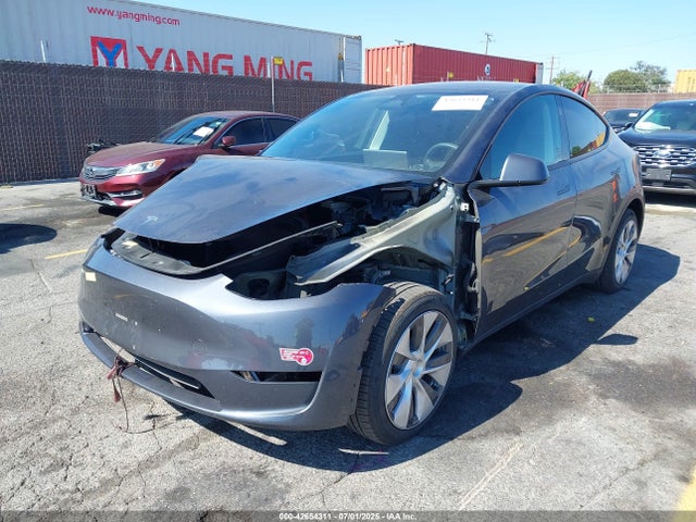 2023 TESLA MODEL Y 7SAYGDED4PF934050 Photo 1