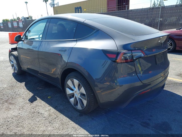 2023 TESLA MODEL Y 7SAYGDED4PF934050 Photo 2