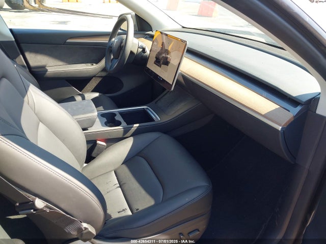 2023 TESLA MODEL Y 7SAYGDED4PF934050 Photo 4