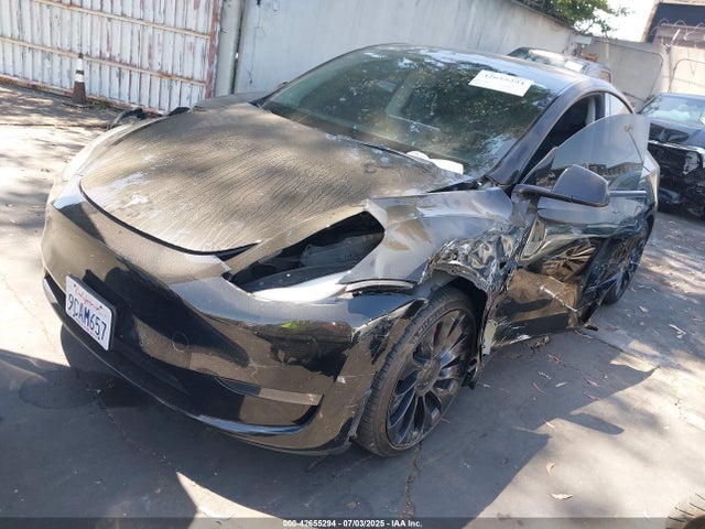 2022 TESLA MODEL Y 7SAYGDEF7NF486871 Photo 1