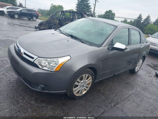 2010 FORD FOCUS 1FAHP3HNXAW240421 Photo 1