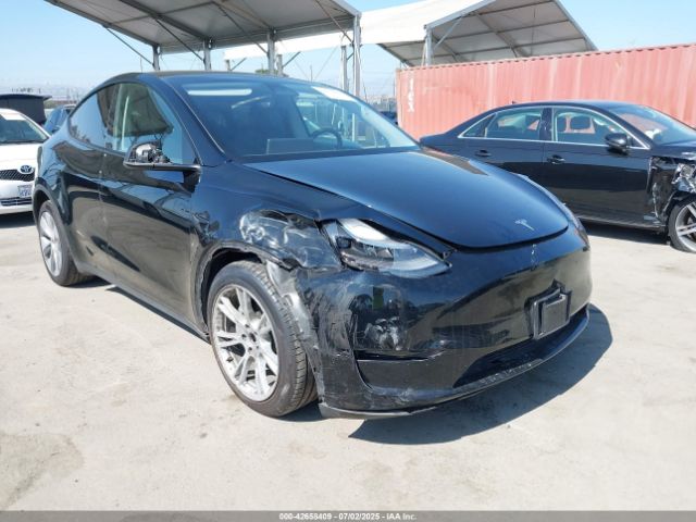 2023 TESLA MODEL Y 7SAYGAEE8PF637435 Photo 0