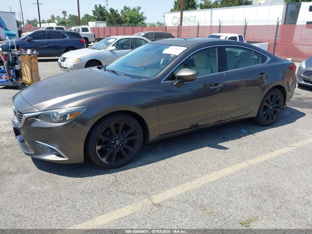 JM1GJ1W53G1417394 Mazda py