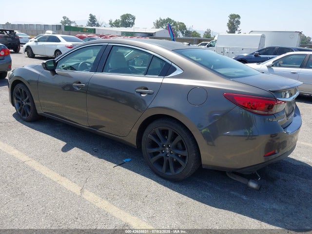 JM1GJ1W53G1417394 Mazda py