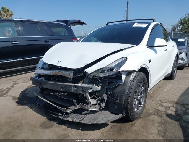 2023 TESLA MODEL Y 7SAYGDEE6PA126577 Photo 1